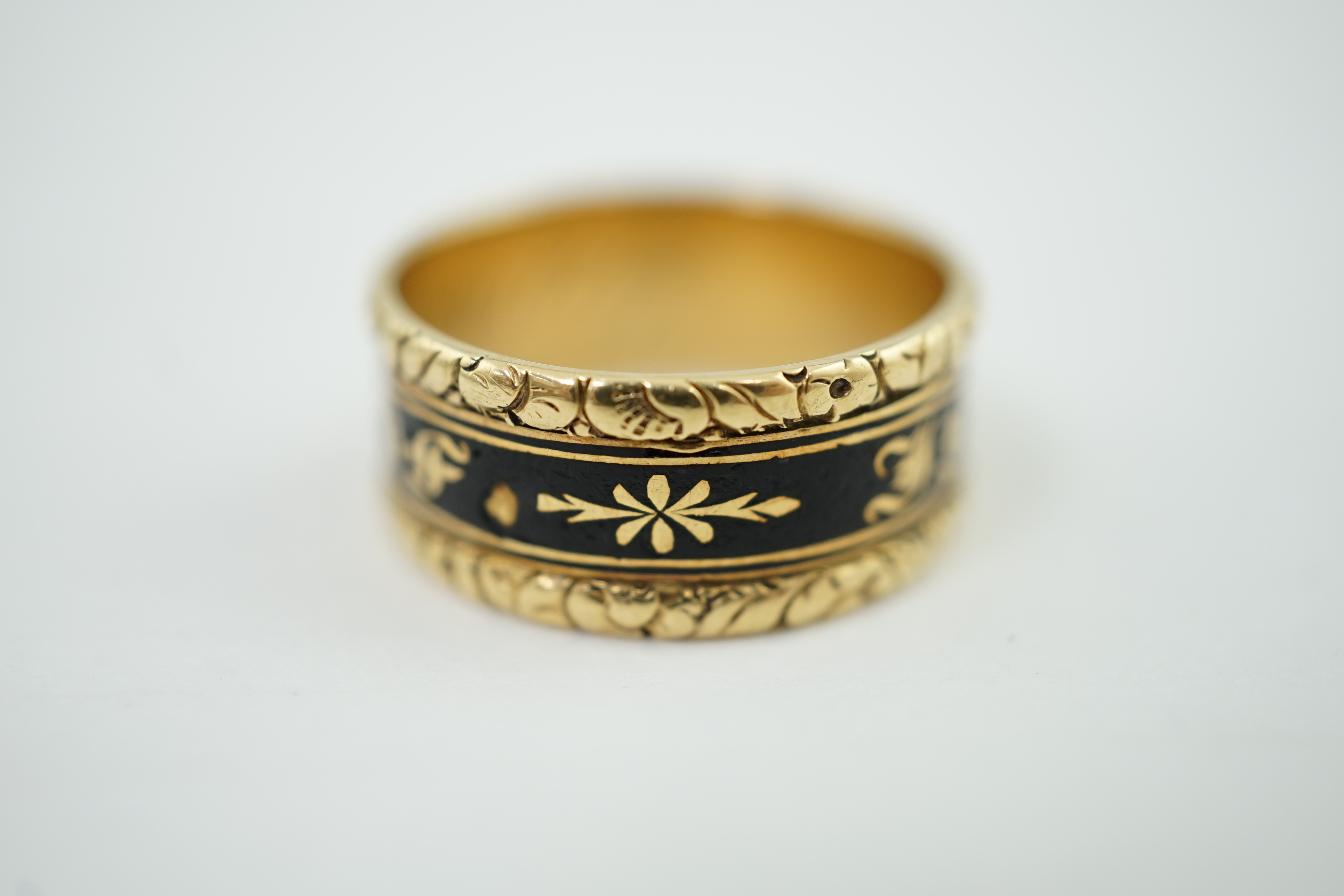 A George IV gold and black enamel mourning band